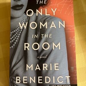 The only woman in the room